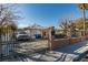 Home with a gated driveway and landscaped yard at 2116 Poplar Ave, Las Vegas, NV 89101