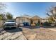 Single-story home with gravel driveway and small front yard at 2116 Poplar Ave, Las Vegas, NV 89101