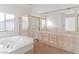 Elegant bathroom with double vanity, soaking tub and shower at 2536 Golden Sands Dr, Las Vegas, NV 89128