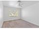 Bright bedroom featuring neutral walls and carpet at 2536 Golden Sands Dr, Las Vegas, NV 89128