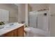 Clean bathroom featuring a tub, shower, and vanity at 2571 Jada Dr, Henderson, NV 89044