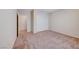 Bedroom with closet, neutral walls, carpet, and an open door at 2571 Jada Dr, Henderson, NV 89044