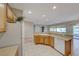 Open kitchen view with bright natural light and a breakfast bar at 2571 Jada Dr, Henderson, NV 89044