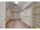 Spacious walk-in closet with ample shelving and hanging space, offering great organization for clothes and accessories at 2571 Jada Dr, Henderson, NV 89044