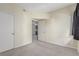 Well-lit bedroom with door to bathroom at 2615 W Gary Ave # 1069, Las Vegas, NV 89123