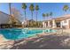 Community pool with plenty of lounge chairs and a large patio area at 2615 W Gary Ave # 1069, Las Vegas, NV 89123