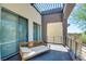 Open-air balcony offers bench seating, iron railing, and a relaxing space with a decorative pergola roof at 2680 Mystere Ct, Las Vegas, NV 89117