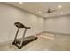 Bright exercise room featuring a treadmill, yoga mats, and ceiling fan at 2680 Mystere Ct, Las Vegas, NV 89117