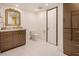 Modern bathroom featuring a toilet, vanity, and a large mirror at 2857 Paradise Rd # 1901, Las Vegas, NV 89109