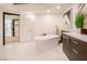 Spa-like bathroom featuring a freestanding tub and walk-in closet at 2857 Paradise Rd # 1901, Las Vegas, NV 89109