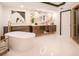 Luxurious bathroom with soaking tub, marble vanity, and modern fixtures at 2857 Paradise Rd # 1901, Las Vegas, NV 89109