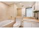 Elegant bathroom with a bathtub, toilet and updated vanity at 2857 Paradise Rd # 1901, Las Vegas, NV 89109