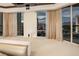 Bedroom with stunning city views at night at 2857 Paradise Rd # 1901, Las Vegas, NV 89109