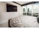 Bright bedroom with a king-size bed and large window with city views at 2857 Paradise Rd # 1901, Las Vegas, NV 89109