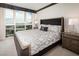 Elegant bedroom with king-size bed, large windows, and city views at 2857 Paradise Rd # 1901, Las Vegas, NV 89109