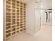 Large closet with custom built-in shelving and mirrored doors at 2857 Paradise Rd # 1901, Las Vegas, NV 89109