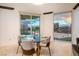 Dining area with a glass table and chairs, offering stunning city views at 2857 Paradise Rd # 1901, Las Vegas, NV 89109