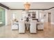 Elegant dining room with a large table and modern chandelier at 2857 Paradise Rd # 1901, Las Vegas, NV 89109