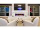 Living room with modern fireplace and stunning night views at 2857 Paradise Rd # 1901, Las Vegas, NV 89109