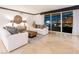 Living room with stunning city views at night at 2857 Paradise Rd # 1901, Las Vegas, NV 89109