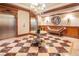 Elegant lobby with marble floors, a chandelier, and comfortable seating at 2857 Paradise Rd # 1901, Las Vegas, NV 89109