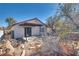 Backyard view featuring desert landscaping and a covered patio at 2935 Kensington St, Las Vegas, NV 89156