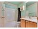 Bathroom featuring a shower-tub combination, toilet, sink with vanity, and medicine cabinet at 2935 Kensington St, Las Vegas, NV 89156