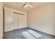 This bedroom boasts neutral walls, carpet, and a closet for storage at 2935 Kensington St, Las Vegas, NV 89156