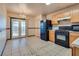 Kitchen featuring modern appliances and a chandelier at 2935 Kensington St, Las Vegas, NV 89156