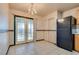 Bright kitchen featuring tile flooring and outdoor access at 2935 Kensington St, Las Vegas, NV 89156