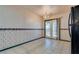 Dining area featuring tile flooring and french doors at 2935 Kensington St, Las Vegas, NV 89156