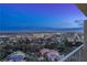 Night time aerial view showcasing city lights and landscape at 3111 Bel Air Dr # 18F, Las Vegas, NV 89109