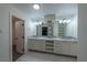 Elegant bathroom with double vanity and marble countertops at 3111 Bel Air Dr # 18F, Las Vegas, NV 89109