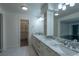 Modern bathroom with double vanity and marble finishes at 3111 Bel Air Dr # 18F, Las Vegas, NV 89109