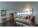 Comfortable bedroom with city views and hardwood floors at 3111 Bel Air Dr # 18F, Las Vegas, NV 89109