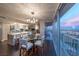 Modern dining area with glass table, and city views at 3111 Bel Air Dr # 18F, Las Vegas, NV 89109