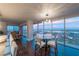 Elegant dining area with glass table and city views at 3111 Bel Air Dr # 18F, Las Vegas, NV 89109