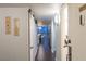 Modern condo hallway with dark hardwood floors at 3111 Bel Air Dr # 18F, Las Vegas, NV 89109