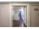 Open door view of condo hallway and living space at 3111 Bel Air Dr # 18F, Las Vegas, NV 89109