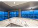 Modern kitchen with marble countertops and city views at 3111 Bel Air Dr # 18F, Las Vegas, NV 89109