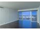 Living room with stunning city views and hardwood floors at 3111 Bel Air Dr # 18F, Las Vegas, NV 89109