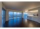 Open living space features floor-to-ceiling windows with city views at 3111 Bel Air Dr # 18F, Las Vegas, NV 89109