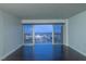 Living room with hardwood floors and city views at 3111 Bel Air Dr # 18F, Las Vegas, NV 89109