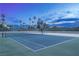 Well-maintained tennis court with surrounding landscape at 3111 Bel Air Dr # 18F, Las Vegas, NV 89109