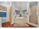 Relaxing bathroom with a bathtub, shower, and linen closet at 348 Wild Plum Ln, Las Vegas, NV 89107