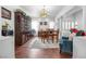 Elegant dining room with hardwood floors and a large hutch at 348 Wild Plum Ln, Las Vegas, NV 89107