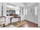 Bright and airy entryway with a half wall separating it from the dining area at 348 Wild Plum Ln, Las Vegas, NV 89107