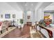 Living room with hardwood floors, neutral walls, and comfortable seating at 348 Wild Plum Ln, Las Vegas, NV 89107