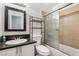 Clean bathroom with tub/shower combo and granite vanity at 3701 Guinevere Ave, Las Vegas, NV 89110