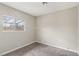 Well-lit bedroom with carpet flooring and window at 3701 Guinevere Ave, Las Vegas, NV 89110